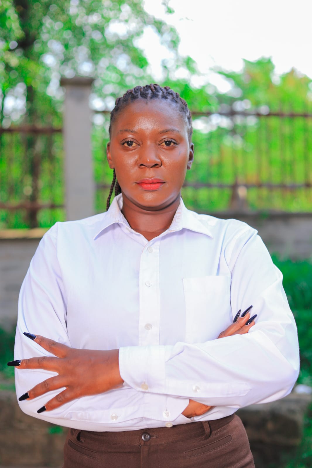Portrait of Christine Adhiambo Oluoch, Founder and CEO